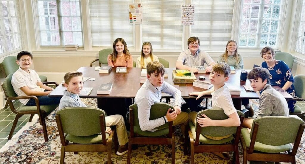 group of children around table